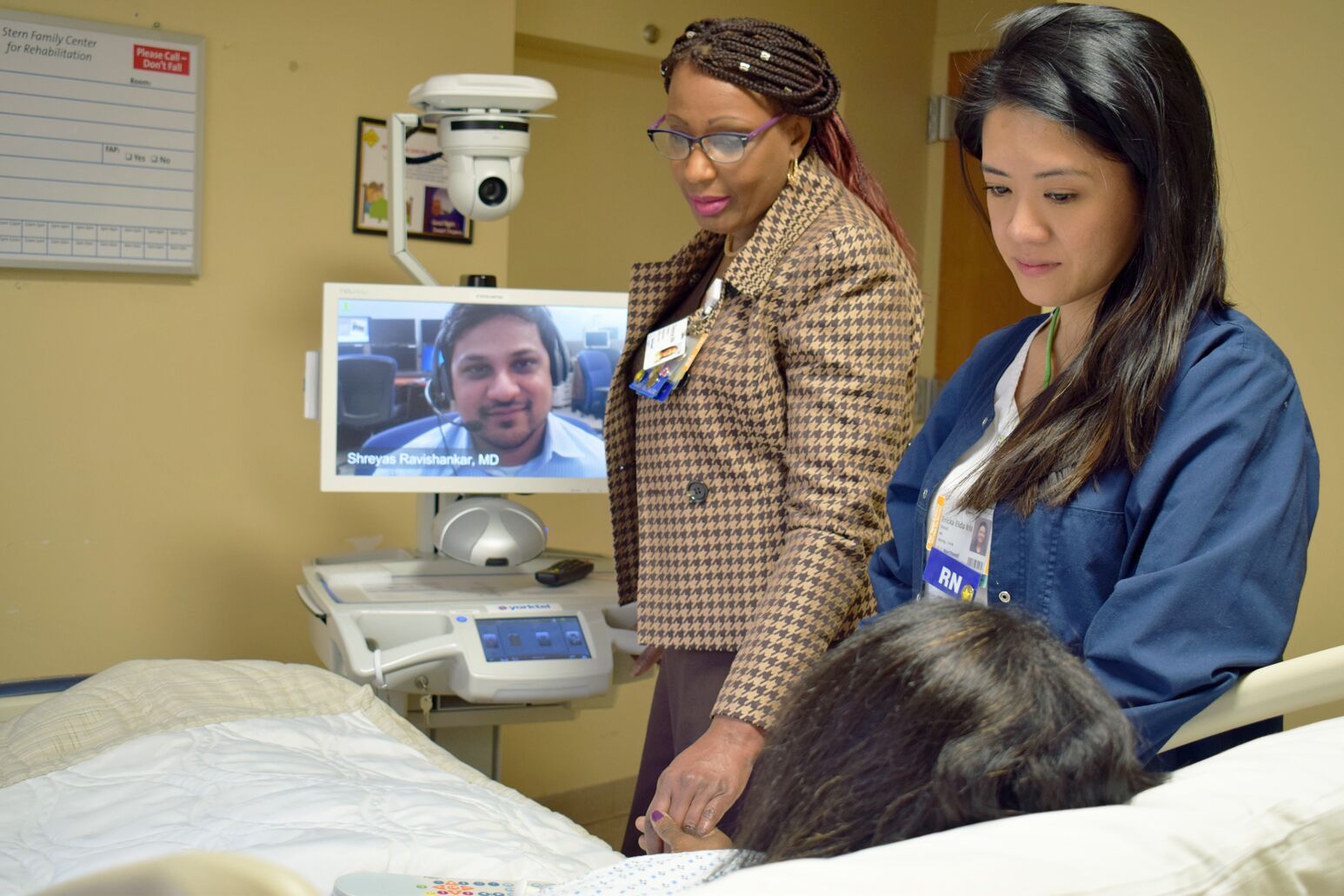 Professional interpreter with doctor and patient